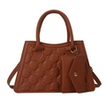 Brown quilted trapezoid crossbody bag with round embossing and mini envelope charm - Brown