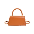 Chic camel brown trapezoid leather handbag with round handle and gold hardware detail - Yellow Brown