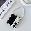 Detail of folding phone case with pearl strap, floral accents and a stylish bow - Cross-grain Bow Leaf (With Pearl Chain) / White / OPPO Find N2 Flip