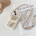 Detalle de funda iPhone con billetera de tweed, conejo de diamantes y correa de cadena - iPhone 7/8/SE 2020 / Albaricoque