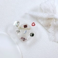 Close-up of heart-shaped phone grip with colorful rhinestones and gold Diamonds text - Drip Glue Heart Stand-Colorful Gems-Laser Pink