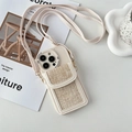 Close-up of cream leather iPhone case with crossbody strap and woven texture wallet - Textured Apricot / 15 Pro Max