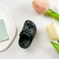 Dettaglio del mini supporto per telefono a forma di zoccolo nero con cinturino - Nero