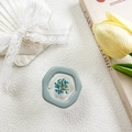 Detail of floral resin phone grip with dried blue flowers and golden beads decoration - Blue