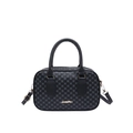 Borsa Boston vintage nera con trama a pois e finiture dorate su sfondo bianco - Nero