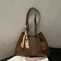 Chic brown leather tote bag with silk scarf decoration on soft knit background - Dark Brown