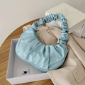 Light blue pleated cloud bag in a white gift box for a stylish minimalist look - Blue