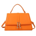 Chic orange trapezoid handbag with gold R logo and adjustable shoulder strap - Orange