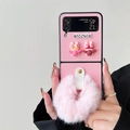 Detail of pink Samsung Z Flip case with plush pom-pom and 3D Bonjour characters - ZFlip5 / Pink