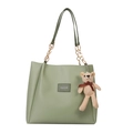 Light green PU leather tote bag with FASHION label and cute bear charm on white background - Green with Pendant