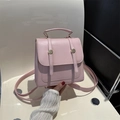Rosa Vintage-Rucksack aus Kunstleder mit goldener Schnalle und Tragegriff für Damen - Rosa