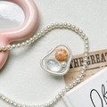Detail of artistic phone grip with pearl and amber beads in an ins-style setup - Irregular Ring Stand - Retro Brown - Silver Spot Rendered Yellow