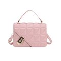 Detail of pink quilted handbag with triangular pattern and gold metal lock closure - Pink