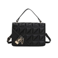 Women's black quilted crossbody bag with gold chain and top handle on white background - Black
