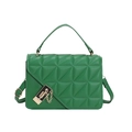 Detail of bright green quilted handbag featuring a distinct geometric clasp and chain - Green