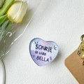 Detail of heart-shaped phone grip with purple gradient design and Spanish text - Crystal Glass Love Heart Light Purple