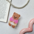 Close-up of cute acrylic brown bear phone grip with pink shirt on aesthetic background - Transparent-Rose Red Ingot Bear