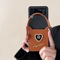 Brown leather Z Flip case with handle, pearl heart design and Aquarius script - Black Heart Card Bag (Aquarius Logo) / Samsung Z Flip3