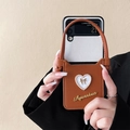Brown leather Z Flip 4 case with pearl heart and gold bow details with hand strap - White Heart Card Bag (Aquarius Logo) / Samsung Z Flip3