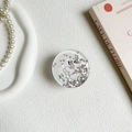 Macro detail of round glitter phone grip with star sequins and cute heart gesture design - Heart Gesture Cat Claw Style (100140)