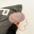 Elegante rosa Pailletten-Abendtasche mit goldener Schleifenschließe und Metallkette - Rosa
