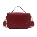 Deep red flap square bag with wide shoulder strap and gold-tone hardware on white background - Red