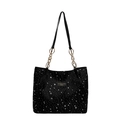Chic black tote bag with white star pattern and elegant gold chain shoulder straps - Black