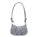 Grey minimalist shoulder bag with abstract lettering and charms on a white background - Blue