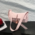 Light pink nylon crossbody bag with dual front pockets and adjustable shoulder strap - Pink