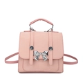 Pink matte PU leather mini backpack for women with a decorative silver metal bow - Pink