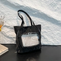 Modern black nylon tote bag with unique wrinkled texture and clear PVC front pocket - Black