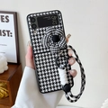 Houndstooth Samsung Z Flip case with large floral ornament and hand strap handle - Houndstooth Flower - Matching Lanyard / Samsung ZFlip3