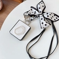 Detail of luxury white leather Z Flip case with pearl gemstone and polka dot bow strap - White / Huawei P50 pocket/s