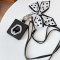 Detail of Galaxy Z Flip case with black gemstone, pearl inlay and polka dot bow strap - Black / Huawei P50 pocket/s