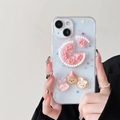 Detalle de funda transparente con purpurina, ositos 3D, conejitos y lazos rosas decorativos - Brillo de Copos de Nieve - Fiesta de tres / iPhone 7/8/SE 2020