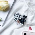 Macro detail of heart-shaped phone grip featuring a black bunny and glitter elements - Starry-Baby Coffee Rabbit