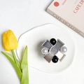 Detail of elegant silver metal hair clip with white pearls and black beads on a white tray - Metal Stand-X Pearl-Silver