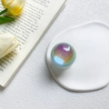 Close-up of holographic glitter ball phone grip with purple and blue laser sparkles - Green