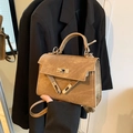 Brown vintage style trapezoid handbag with silver twist lock and single top handle - Brown