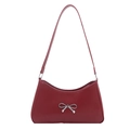 Red PU leather underarm bag with silver metal bow decoration and zipper closure - Red