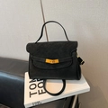 Matte black leather tote bag with golden metal twist lock and adjustable shoulder strap - Black