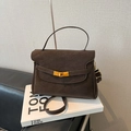 Fashionable dark brown matte tote bag with top handle and golden buckle for women - Coffee