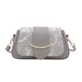 Grey faux leather saddle bag with gold metal trim and abstract letter prints - Silver