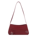 Retro burgundy shoulder bag with decorative belt straps and silver buckles on white background - Red