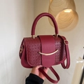 Minimalist burgundy woven leather crossbody handbag with gold hardware for women - Red