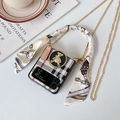 Detail of Galaxy Z Flip case with black plaid pattern, gold bear charm, and silk ribbon - Checkered Pattern - Gold Bear Stand - Silk Scarf Handle - Crossbody Chain / Samsung ZFlip3