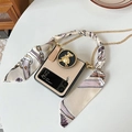 Champagne gold Galaxy Z Flip case with teddy bear relief and elegant floral silk ribbon - Fine Leather Grain - Gold Bear Stand - Silk Scarf Handle - Crossbody Chain / Samsung ZFlip3