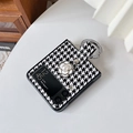 Detail of camellia flower and rhinestone ring handle on houndstooth phone case - White / Samsung ZFlip3