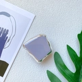 Close-up of a purple irregular square phone socket with metallic silver plating - Purple