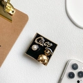 Detail of square black enamel bear brooch with pearl and artistic metallic lettering - Square Pearl Bear-Gold (700268)